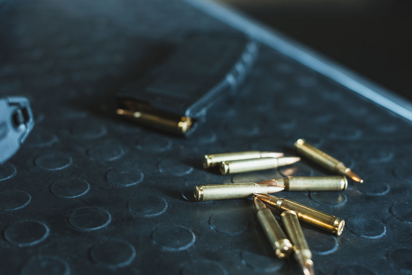 Ammunition on table with gun clip