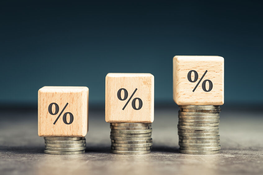 Wood blocks with percentage symbol on heap coins stair, increase percentage on increase money