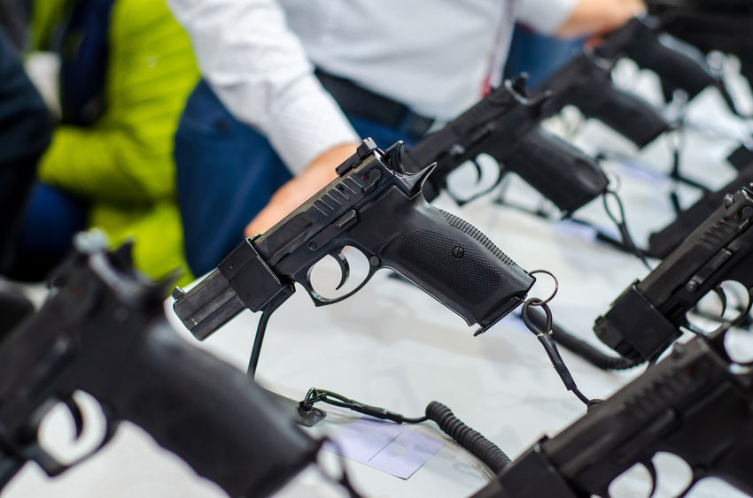 Gun Display Stands. Pistols for sale in the store.